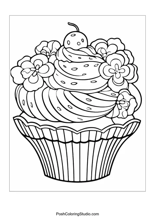 A cupcake topped with a flower and decorative leaves.