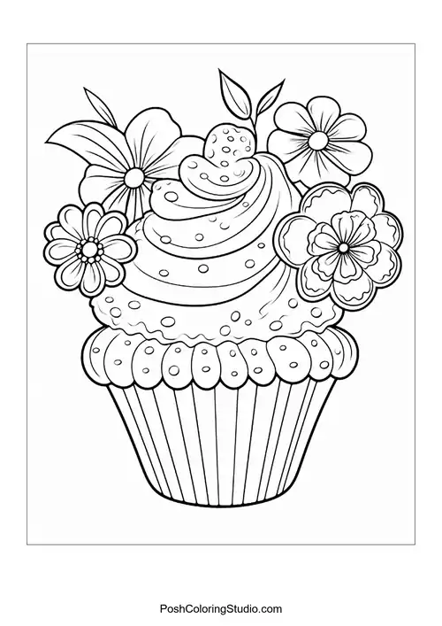 A cupcake with a flower and decorative leaves.