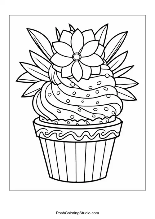 A cupcake topped with a flower and decorative leaves.